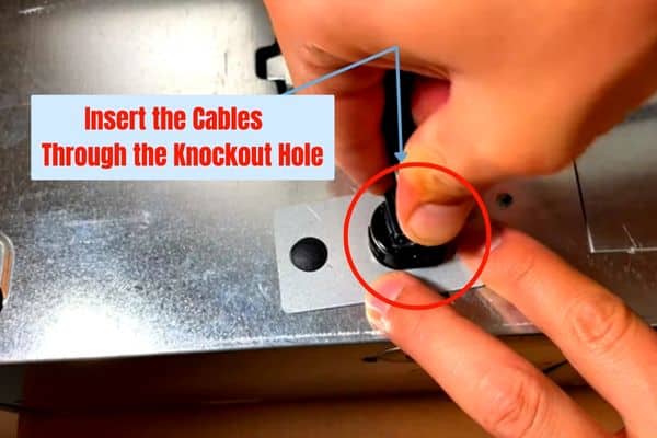 Insert the Cables Through the Knockout Hole